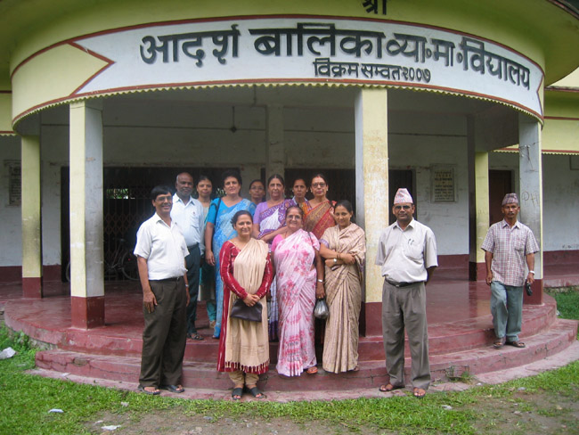 Teachers in Front of Laura's School