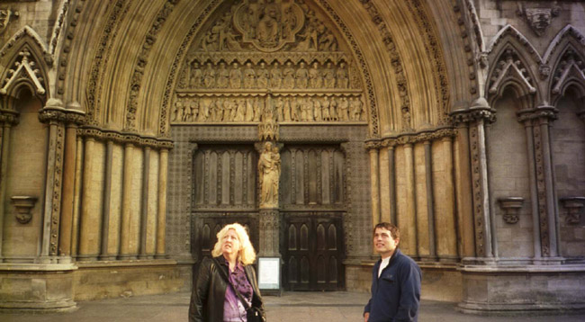 Colin and Dorene in front of Westminster Abbey, looking beatific