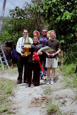 The groom's party (Colin, Aarron, Orion, and Quintin), bearing gifts