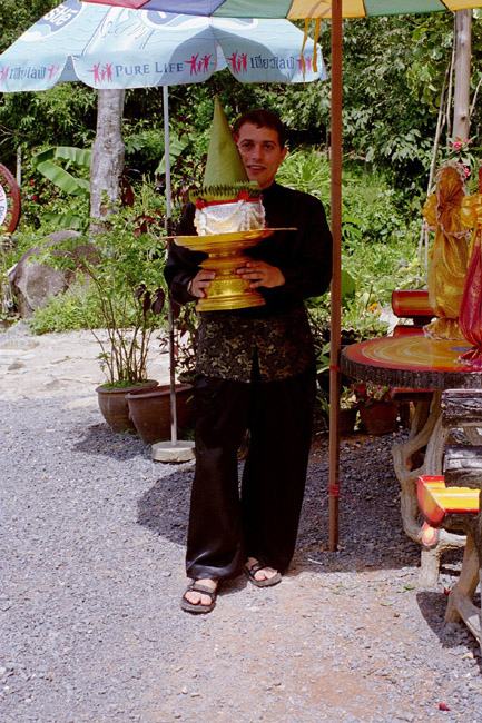 Colin, the groom, prepares to bring the gifts and wedding rings to the wedding site