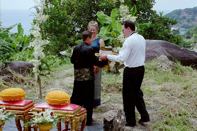 Aarron serves out his duties as best man after Colin presents the rings