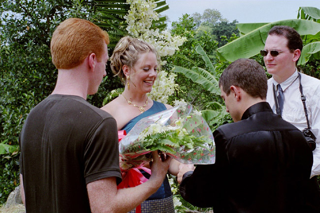 ...and then places the ring on her finger