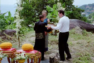Aarron serves out his duties as best man after Colin presents the rings
