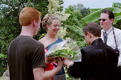 ...and then places the ring on her finger